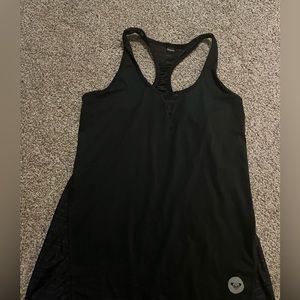 Medium Roxy light weight tank top with mesh back, great condition